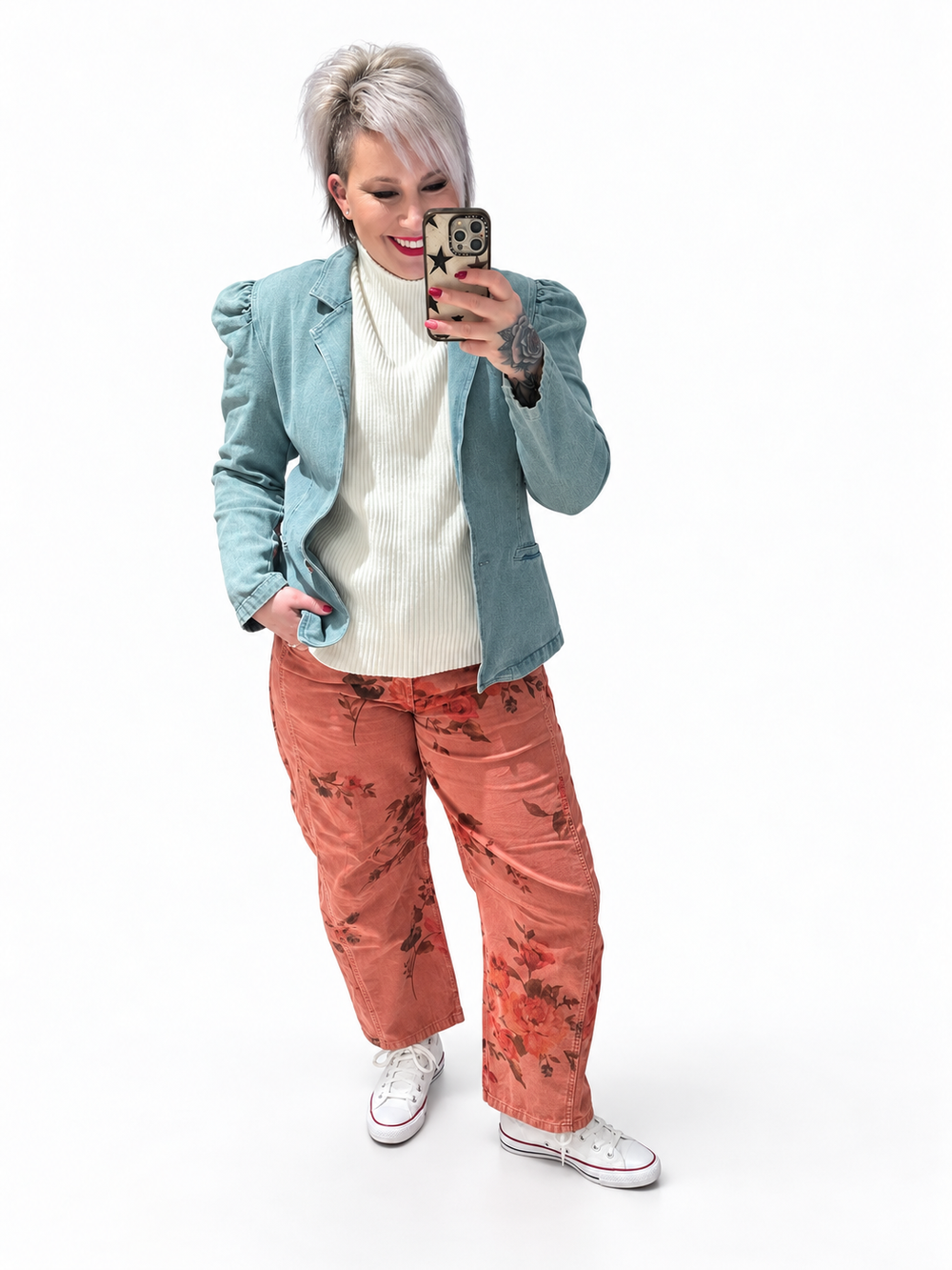 Jennifer styling a blue blazer and floral trousers