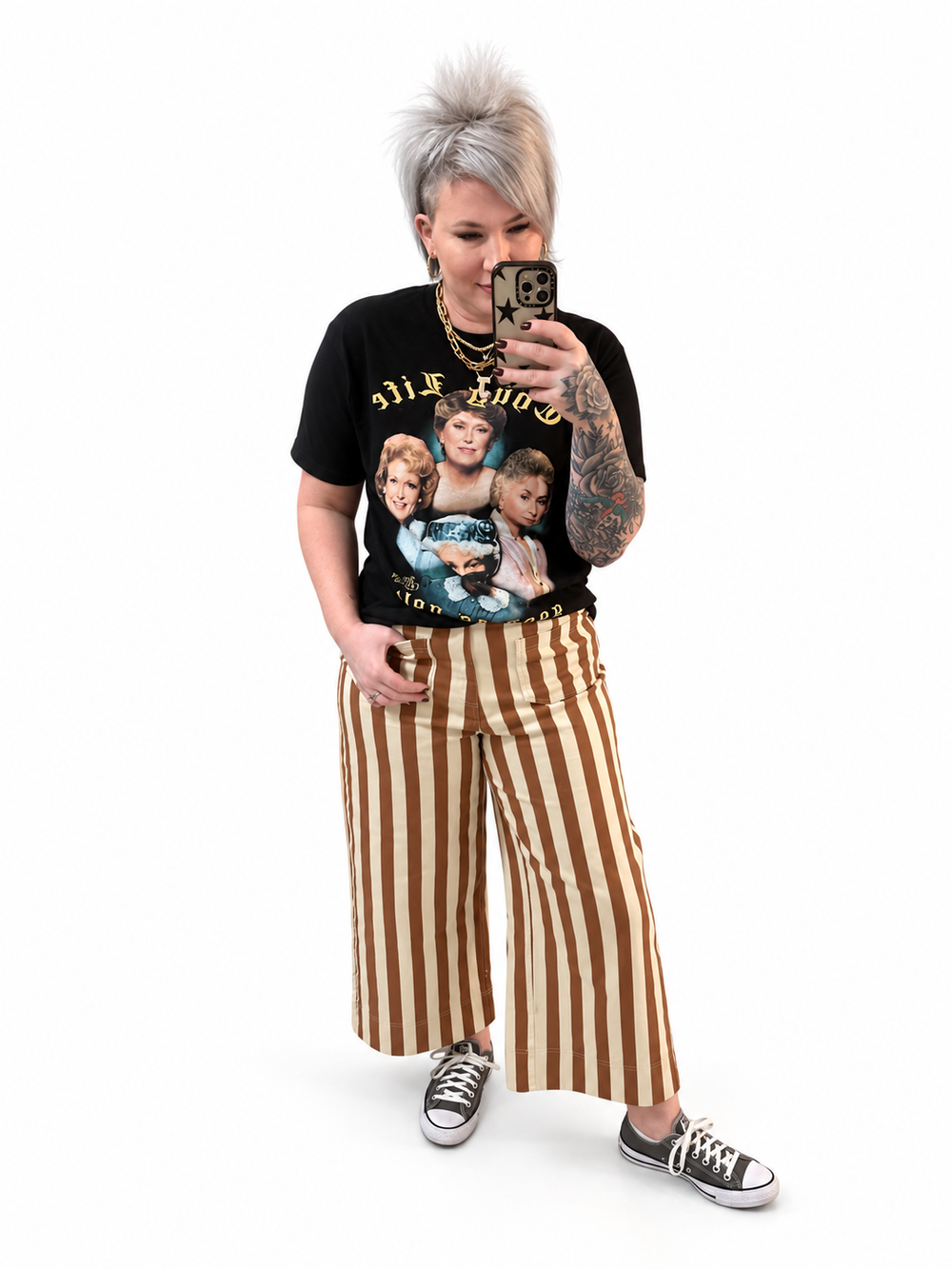 Jennifer styling a Golden Girls graphic tee with striped trousers