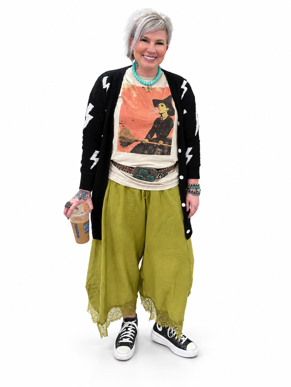 Jennifer styling a graphic tee, lightning cardigan and olive trousers